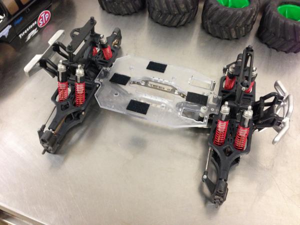 Old E-Maxx (3906) with Pro-Line Wide Suspension, and a custom Lexan center chassis I made a long time ago.  This truck is INCREDIBLY LIGHT WEIGHT